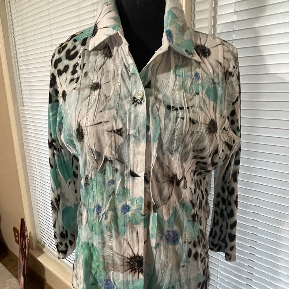 Women’s size large colorful, button-down stretch top.